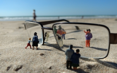 Miniature figures near glasses