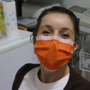 Nurse wearing orange face mask