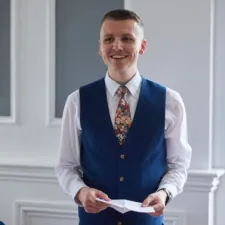 James Taylor, patient, giving a speech at his wedding after successful and life changing ICL surgery at Optegra