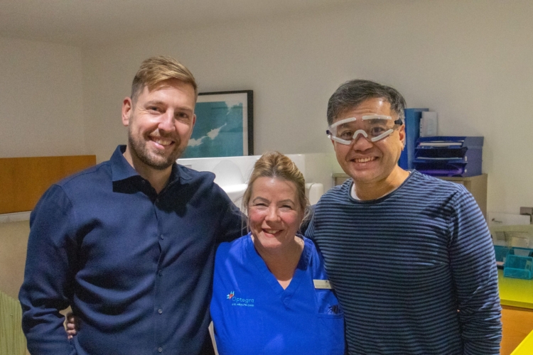 Amir post surgery with Mr Alastair Stuart, surgeon, and Alison, nurse.