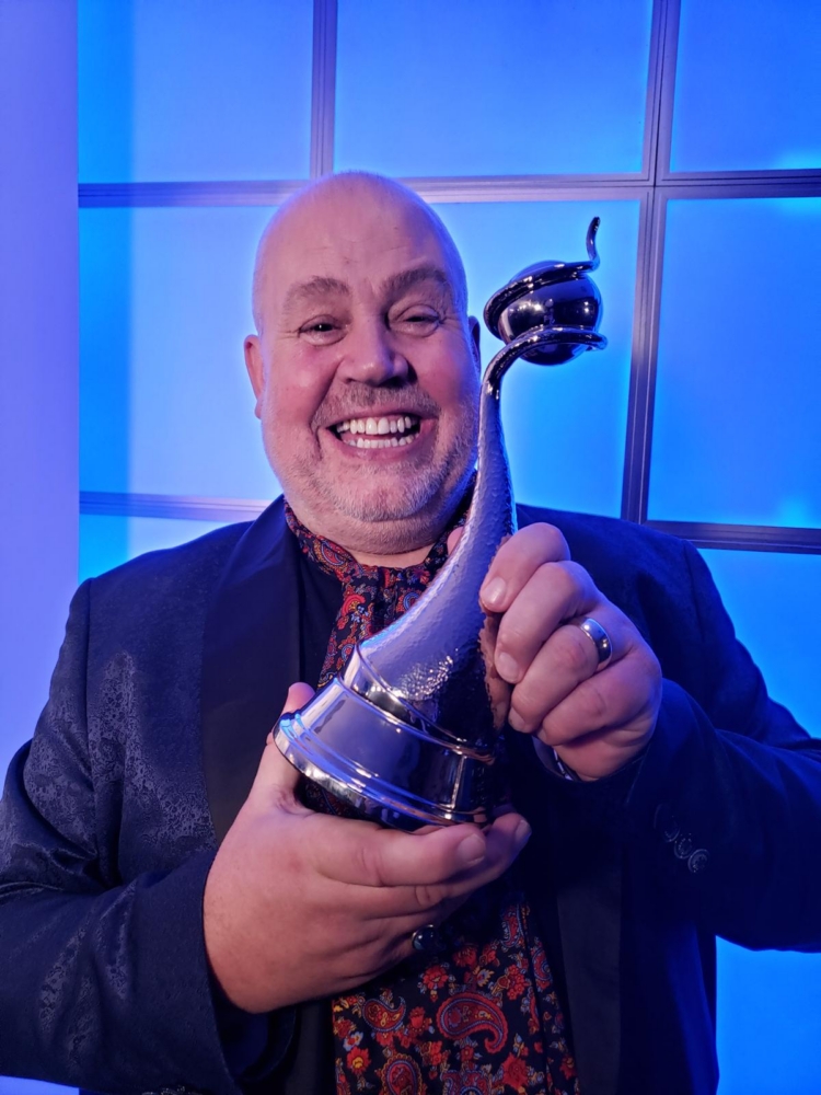 Cliff Parisi, actor, with award